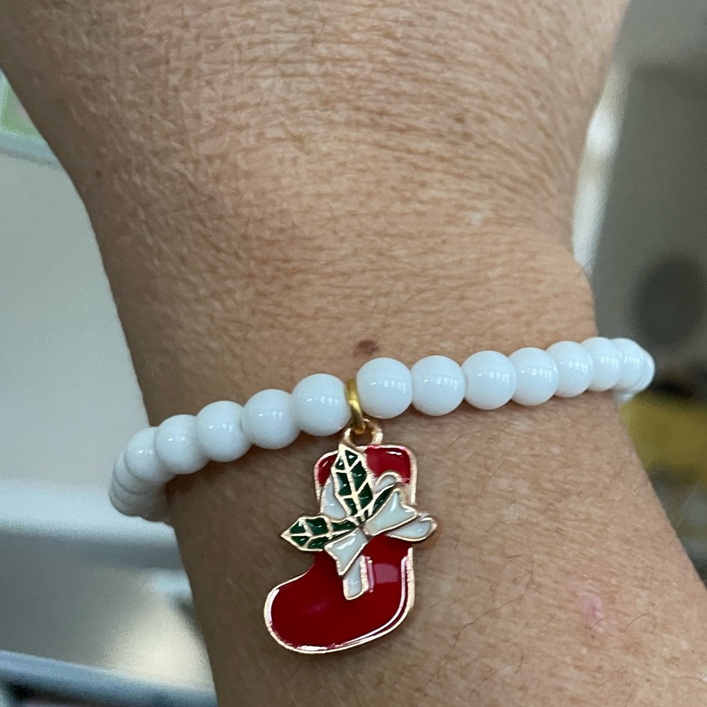 Nice sturdy Bracelet in white beads and stocking charm. Get ready for Christmas